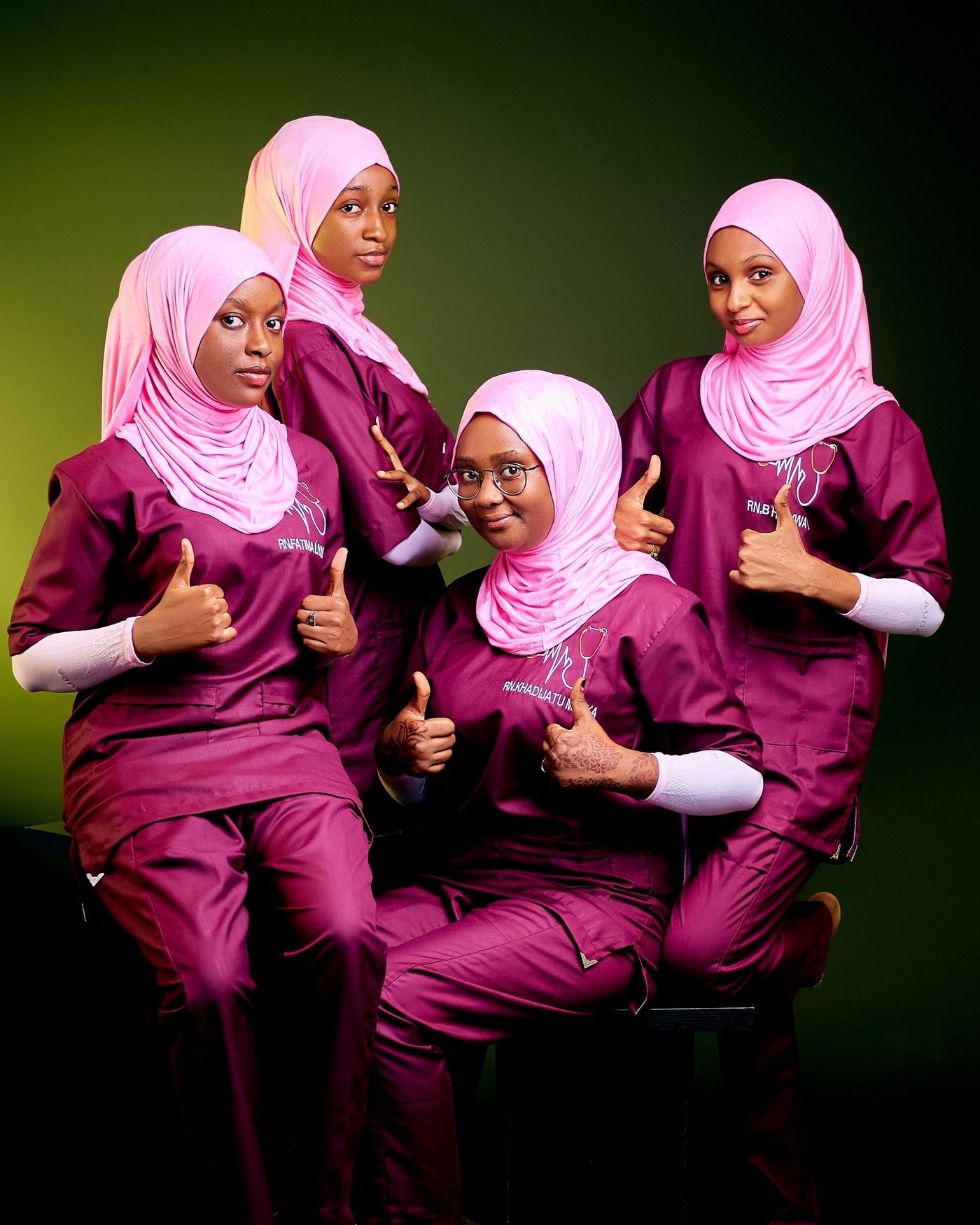 A diverse team of nurses and care staff standing together in uniform